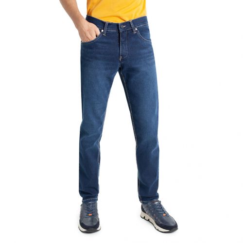 Color azul con roces y desgastes - Jeans de hombre, pantalón vaquero en tejido denim azul lavado con desgastes de algodón con lycra e hilo a contraste en línea Slim Fit.